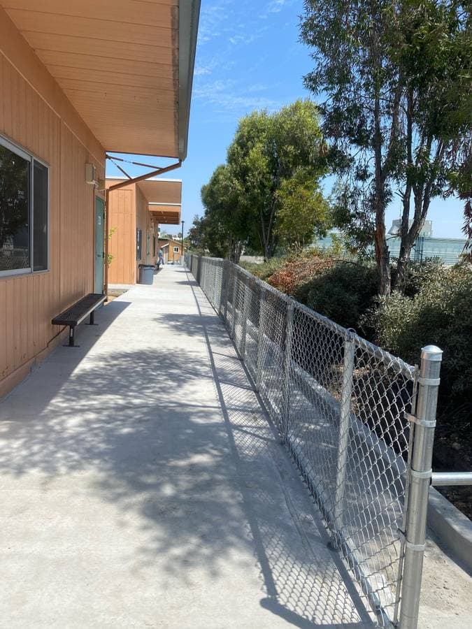 newly installed silver chainlink fence